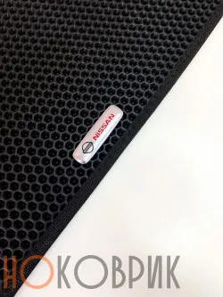 Фурнитура для автоковриков: логотип Nissan 